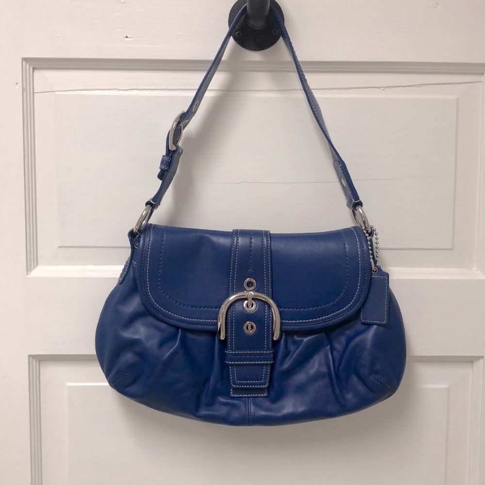 Bright blue coach handbag gently used no marks or scratches.